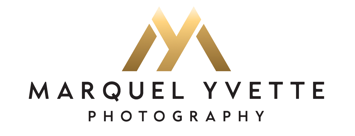 Marquel Yvette Photography professional logo with gold geometric mountain shape and black sans-serif typography