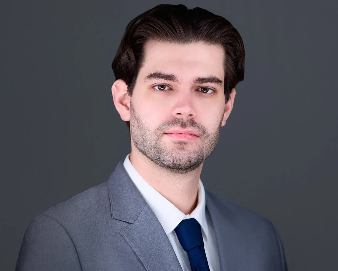 Corporate headshot for Loudoun County professional in business attire with confident expression