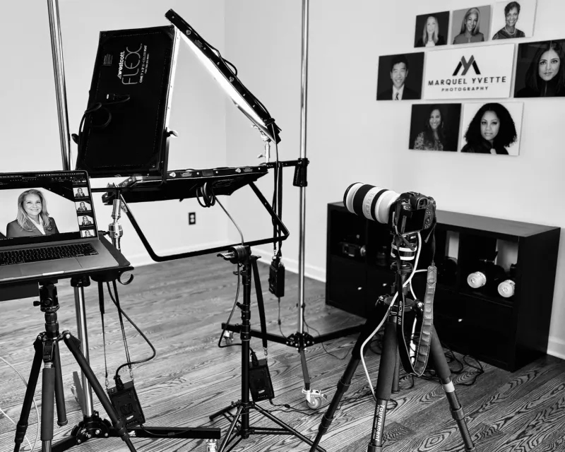 Marquel Yvette Photography studio interior with professional lighting equipment and headshot portfolio display
